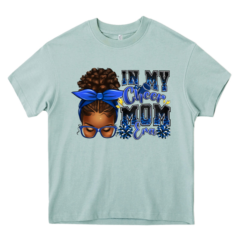 In My Cheer Mom Era Afro Messy Bun Heavy Core Tee by texasbilliewilder | Teevron