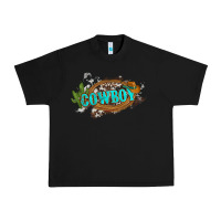 Black western cowboy and hat with cactus and cowhide Urban Heavy Tee - Artiststas