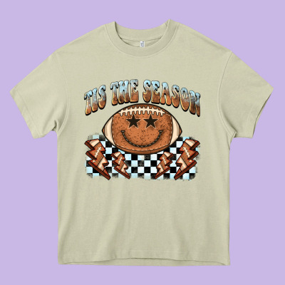 Tis The Season Football Smiley Face Heavy Core Tee Designed By Barkaloodesign