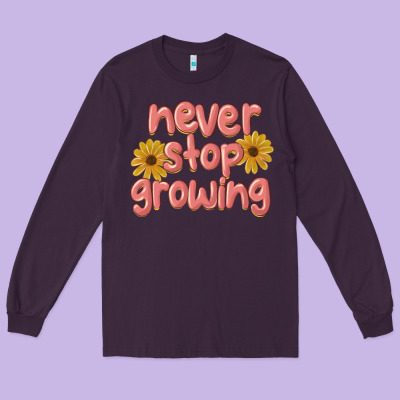 Never Stop Growing Long Sleeve Tee Designed By Maliassmallbusiness