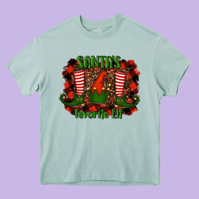 Santa's Favorite Elf Heavy Core Tee Designed By Ranaportraitstore