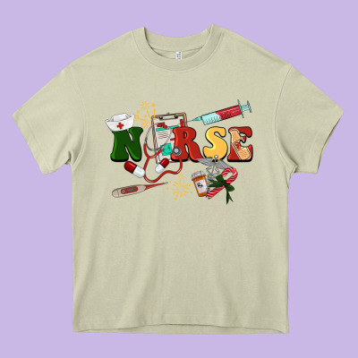 Christmas Nurse Heavy Core Tee Designed By Barkaloodesign