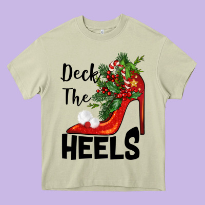 Deck The Heels Christmas Heavy Core Tee Designed By Barkaloodesign