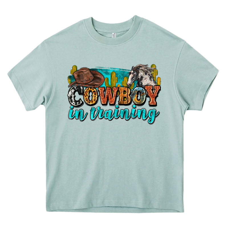 Cowboy In Training Heavy Core Tee by Zillion Design Studio | Teevron