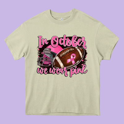 In October We Wear Pink With Football Heavy Core Tee Designed By Barkaloodesign