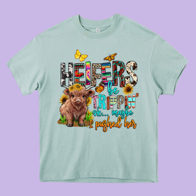 Heifers Be Trippin Ok Maybe I Pushed Her Heavy Core Tee Designed By Barkaloodesign