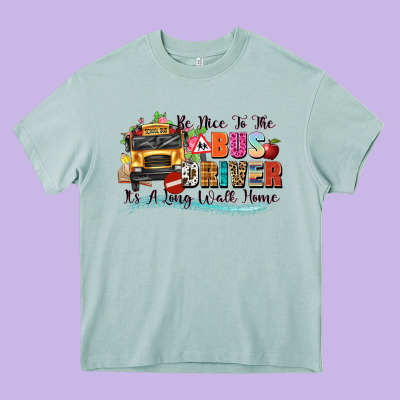 Be Nice To The Bus Driver Its A Long Walk Home Heavy Core Tee Designed By Texasbilliewilder