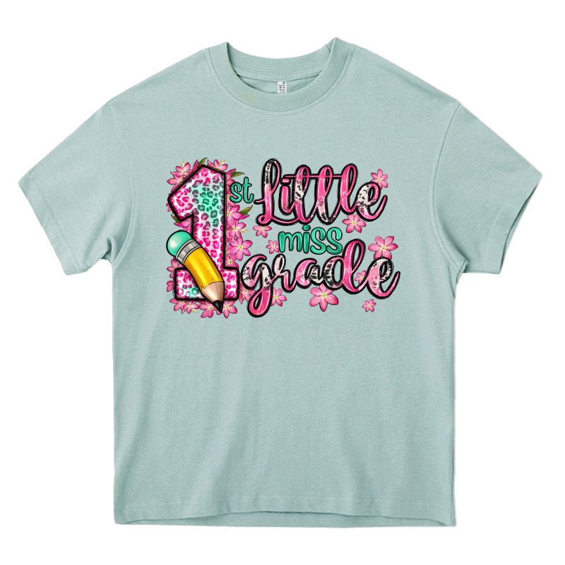 Little Miss 1st Grade Heavy Core Tee by Zillion Design Studio | Teevron