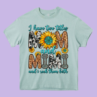 I Have Two Titles Mom And Mimi And I Rock Them Bot Heavy Core Tee Designed By Zillion Design Studio