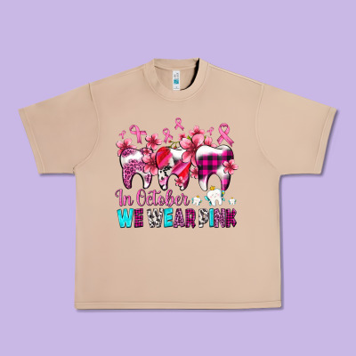 In October We Wear Pink Cancer Ribbon With Teeth Urban Heavy Tee Designed By Adodesignshop