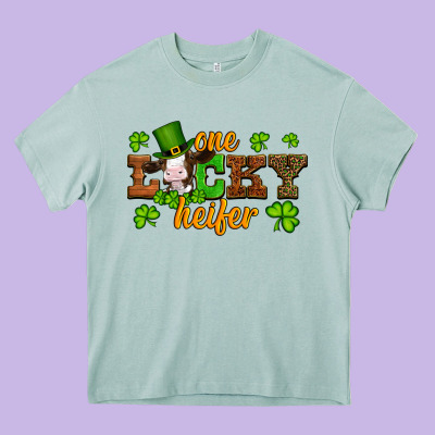 St Patricks One Lucky Heifer Baby Cow Heavy Core Tee Designed By Artiststas