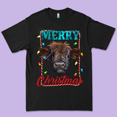 Merry Christmas Highland Calf Baby Cow Premium Tee Designed By Ranaportraitstore