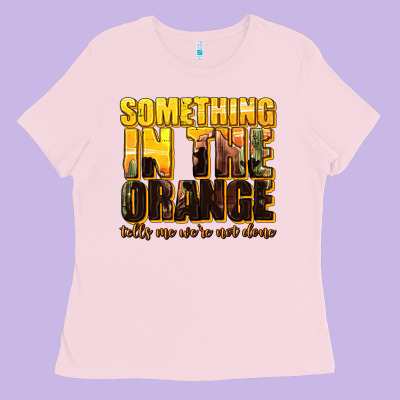 Ladies Tee something in the orange western