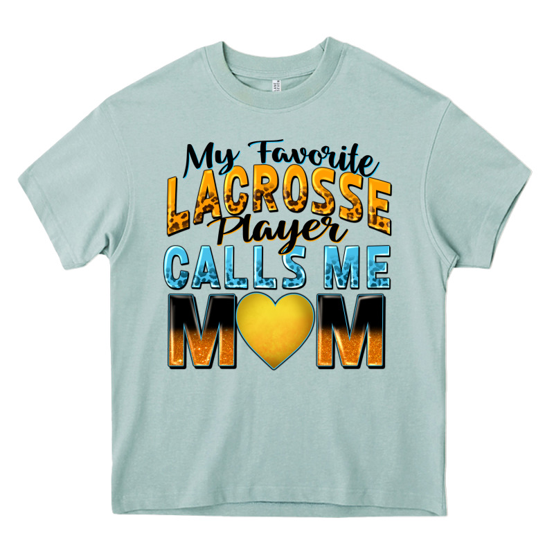 My Favorite Lacrosse Player Calls Me Mom Heavy Core Tee by Zillion Design Studio | Teevron