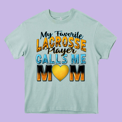 My Favorite Lacrosse Player Calls Me Mom Heavy Core Tee Designed By Zillion Design Studio