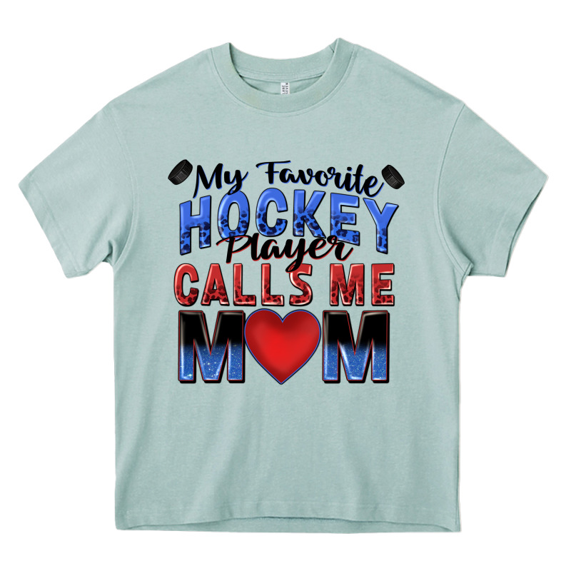 My Favorite Hockey Player Calls Me Mom Heavy Core Tee by Zillion Design Studio | Teevron