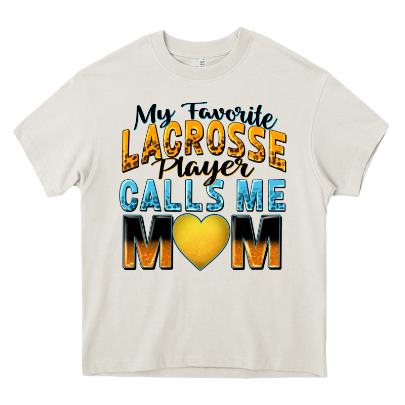My Favorite Lacrosse Player Calls Me Mom Heavy Core Tee by Zillion Design Studio | Teevron