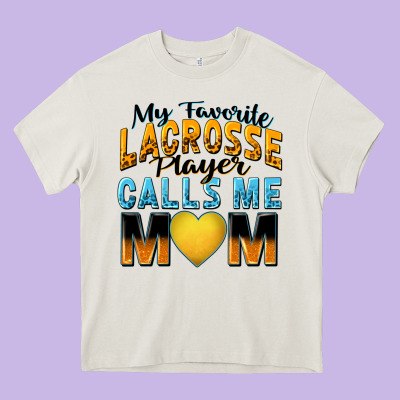 My Favorite Lacrosse Player Calls Me Mom Heavy Core Tee Designed By Zillion Design Studio