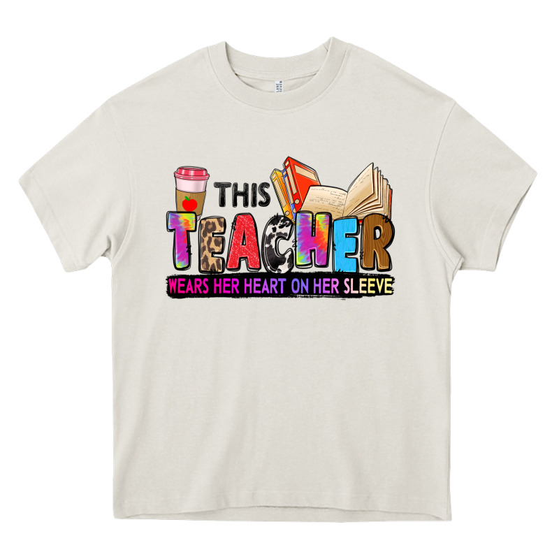 This Teacher Wears Her Heart On Her Sleeve Heavy Core Tee by Zillion Design Studio | Teevron