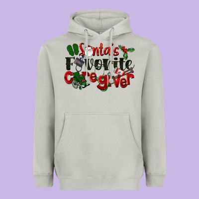 Santa's Favorite Caregiver Christmas Heavyweight Hoodie Designed By Lillyallendesigns
