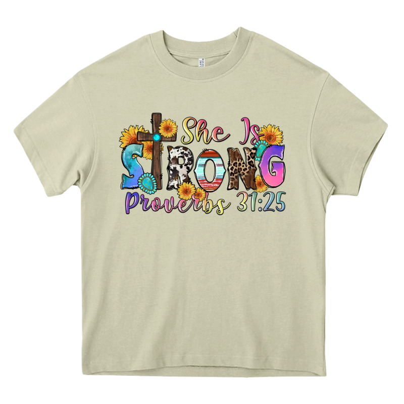She Is Strong Proverbs 31 25 Heavy Core Tee by Zillion Design Studio | Teevron