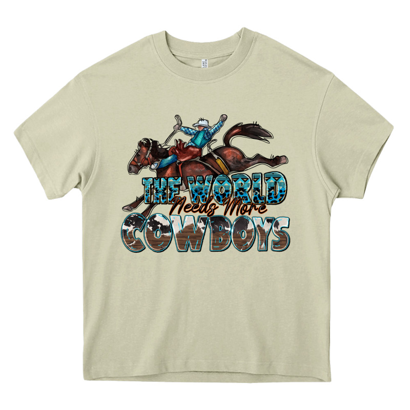 The World Needs More Cowboys Heavy Core Tee by Zillion Design Studio | Teevron