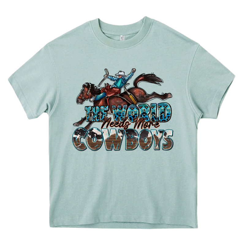The World Needs More Cowboys Heavy Core Tee by Zillion Design Studio | Teevron
