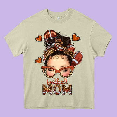 Football Messy Bun Mom Heavy Core Tee Designed By Texasbilliewilder