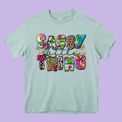 Sassy Little Thing Heavy Core Tee Designed By Zillion Design Studio