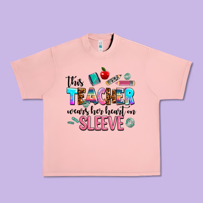 This Teacher Wears Her Heart On Sleeve Urban Heavy Tee Designed By Adodesignshop