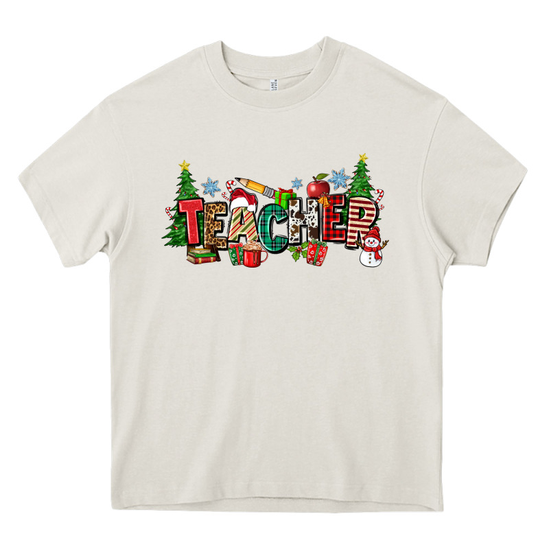 Christmas Teacher Heavy Core Tee by Zillion Design Studio | Teevron