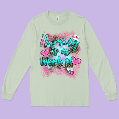 Nursing Is A Work Of Long Sleeve Tee Designed By Barkaloodesign