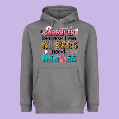 Caregiver Because Nurses Need Heroes Heavyweight Hoodie Designed By Lillyallendesigns