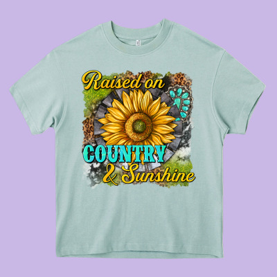 Raised On Country And Sunshine Heavy Core Tee Designed By Texasbilliewilder