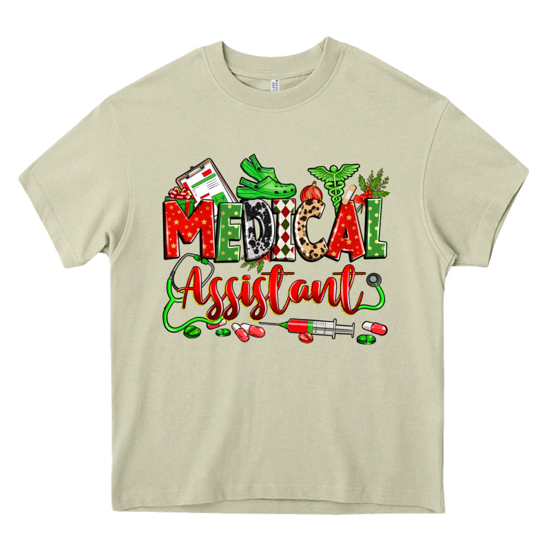Christmas Medical Assistant Heavy Core Tee by Zillion Design Studio | Teevron
