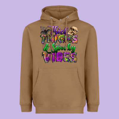 Thick Thighs And Spooky Vibes Heavyweight Hoodie Designed By Bundleandbundleshop