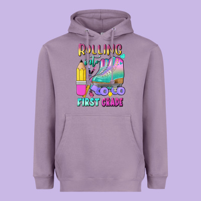 Rolling Into First Grade Heavyweight Hoodie Designed By Bundleandbundleshop