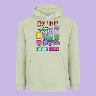 Rolling Into Fifth Grade Heavyweight Hoodie Designed By Bundleandbundleshop