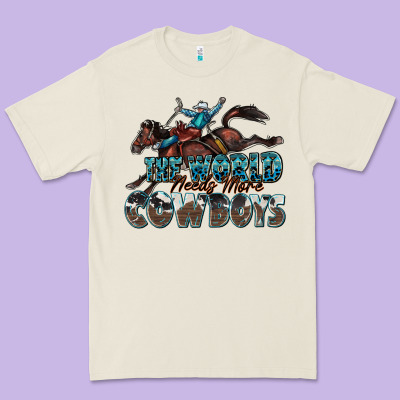 The World Needs More Cowboys Premium Tee Designed By Zillion Design Studio
