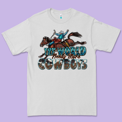 The World Needs More Cowboys Premium Tee Designed By Zillion Design Studio