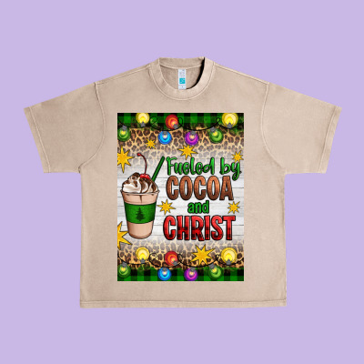 Christmas Fueled By Cocoa And Christ Urban Heavy Tee Designed By Artiststas