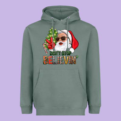 Don't Stop Believing Santa Heavyweight Hoodie Designed By Bundleandbundleshop