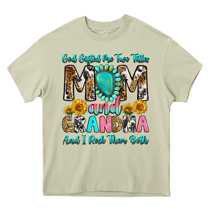 God Gifted Me Two Titles Mom And Grandma And I Roc Heavy Core Tee by RanaPortraitStore | Teevron