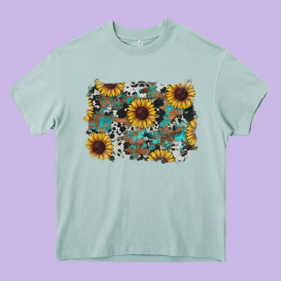 Heavy Core Tee western sunflowers turquoise cowhide background