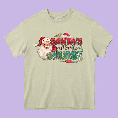 Santa's Favorite Nurse Heavy Core Tee Designed By Maliassmallbusiness