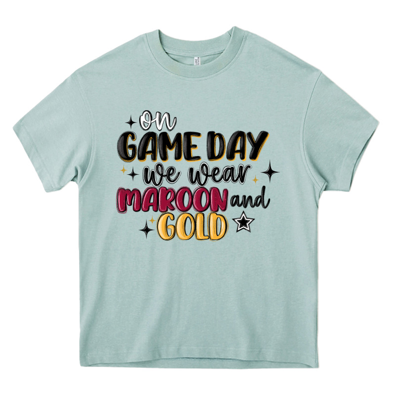 On Game Day We Wear Maroon And Gold Heavy Core Tee by MaliasSmallBusiness | Teevron