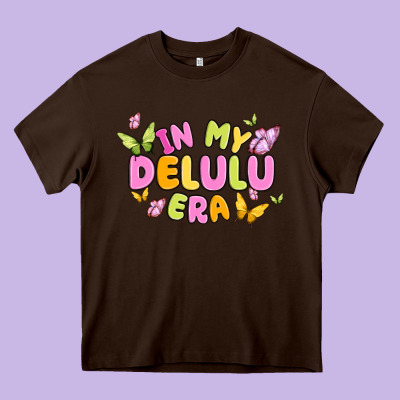 In My Delulu Era Heavy Core Tee Designed By Maliassmallbusiness