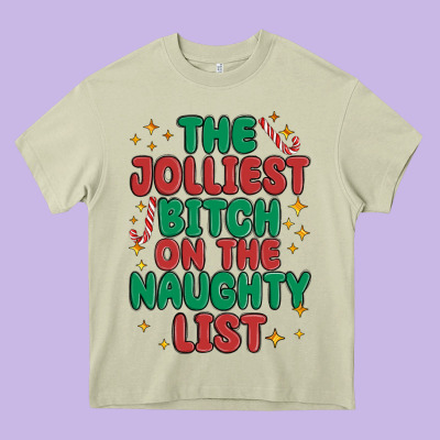The Jolliest Bitch On The Naughty List Heavy Core Tee Designed By Maliassmallbusiness