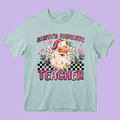 Santa's Favorite Teacher Heavy Core Tee Designed By Maliassmallbusiness