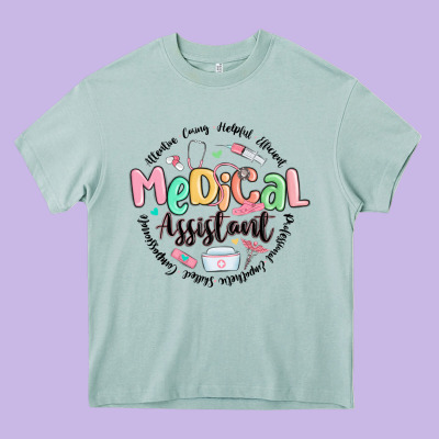 Medical Assistant Nurse Heavy Core Tee Designed By Maliassmallbusiness